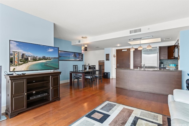 1837 Kalakaua Ave Unit 2209, Honolulu, HI 96815 - living room featuring wood finished floors