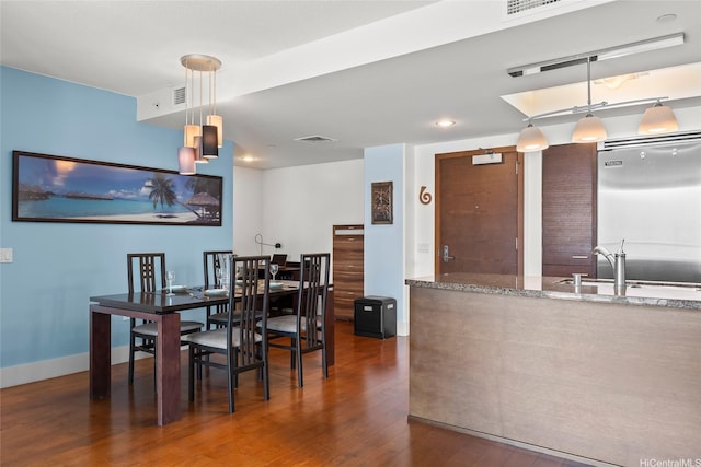 1837 Kalakaua Ave Unit 2209, Honolulu, HI 96815 - dining space featuring dark wood finished floors and baseboards