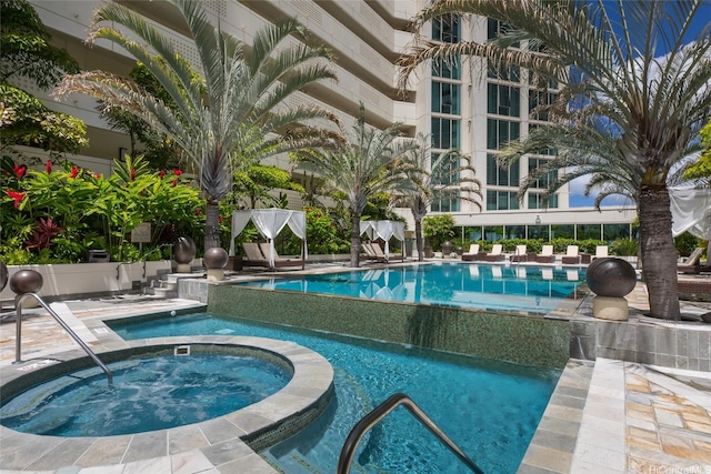 1837 Kalakaua Ave Unit 2209, Honolulu, HI 96815 - view of pool featuring a pool with connected hot tub and a patio