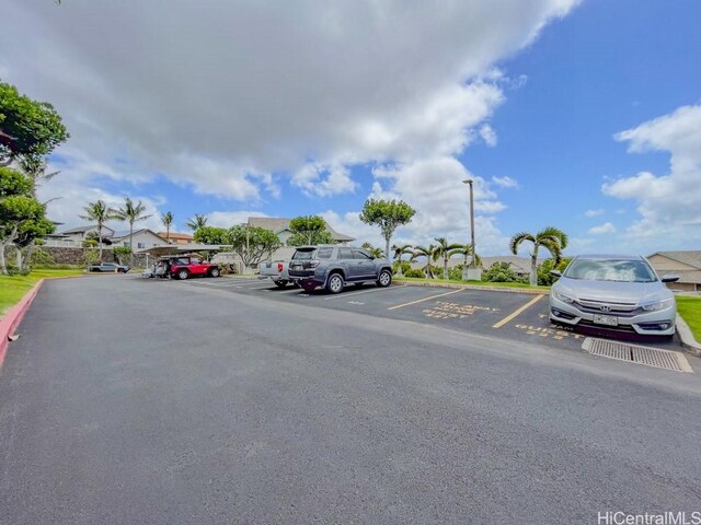 92-1226 Palahia St Unit Cc105, Kapolei, HI 96707 - view of asphalt street featuring street lighting, curbs, and a residential view