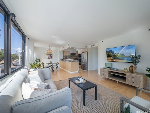 2232 Kapiolani Blvd Unit 303, Honolulu, HI 96826 - living area featuring light wood-type flooring