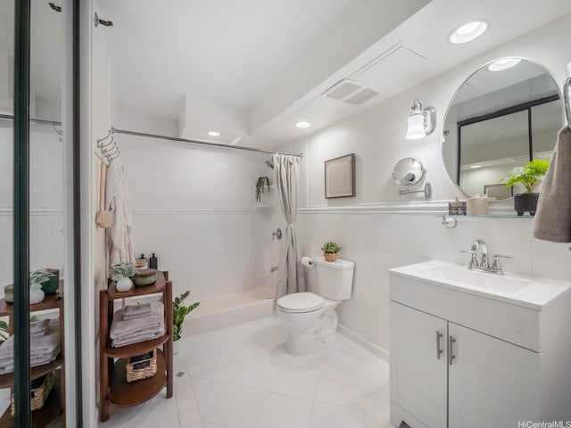 2232 Kapiolani Blvd Unit 303, Honolulu, HI 96826 - full bathroom with vanity, a tile shower, tile patterned flooring, tile walls, and recessed lighting