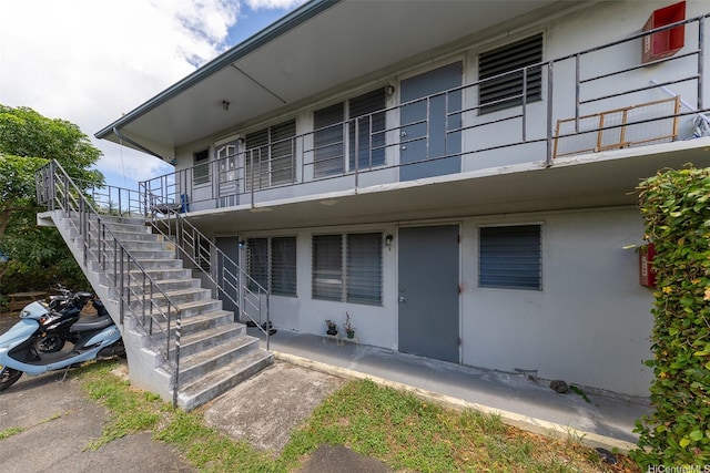 1640 Lusitana St, Honolulu, HI 96813 - view of side of property with stairs and stucco siding