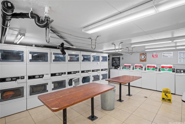 2888 Ala Ilima St Unit 806, Honolulu, HI 96818 - shared laundry with stacked washer / dryer, washer and dryer, and tile patterned floors