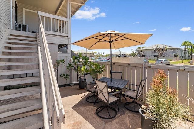 91-1024 Kaiau Ave Unit 4E, Kapolei, HI 96707 - view of patio / terrace with stairway, outdoor dining space, and a residential view