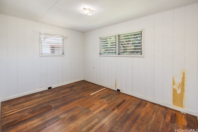 98-219 Pahemo St, Aiea, HI 96701 - spare room with dark wood-type flooring