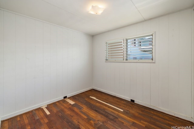 98-219 Pahemo St, Aiea, HI 96701 - empty room with dark wood finished floors
