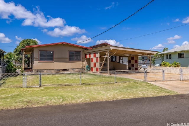 98-219 Pahemo St, Aiea, HI 96701 - manufactured / mobile home featuring a gate, an attached carport, and driveway