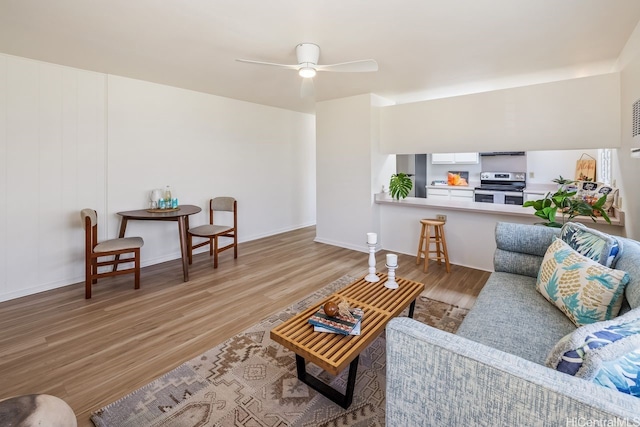 98-219 Pahemo St, Aiea, HI 96701 - living area featuring light wood-type flooring and a ceiling fan