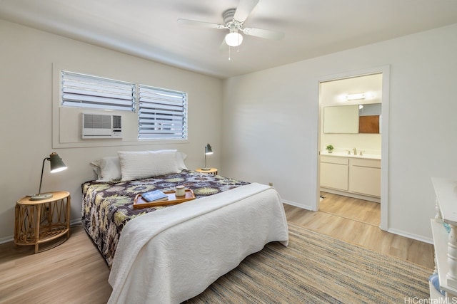 98-219 Pahemo St, Aiea, HI 96701 - bedroom featuring light wood-type flooring, connected bathroom, and a ceiling fan