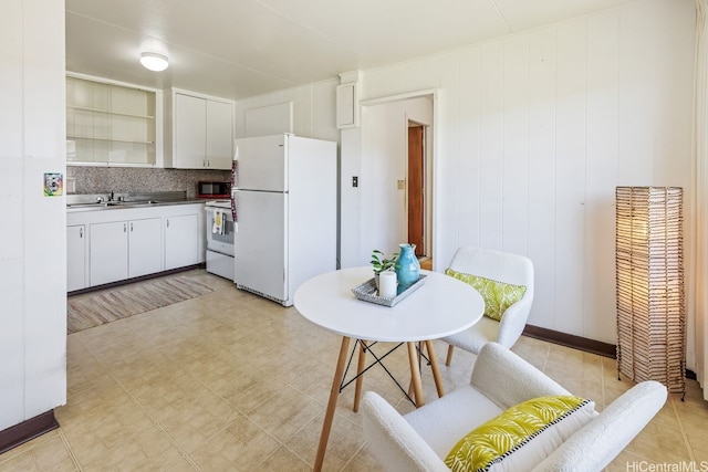 98-219 Pahemo St, Aiea, HI 96701 - kitchen with white appliances, tasteful backsplash, white cabinets, light flooring, and open shelves