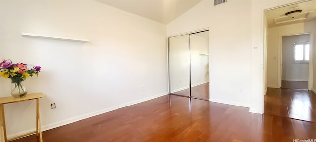 91-6560 Kapolei Pkwy Unit 3G5, Ewa Beach, HI 96706 - unfurnished bedroom with wood finished floors, a closet, and lofted ceiling
