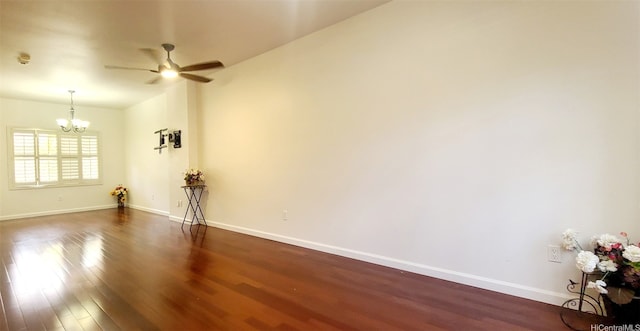 91-6560 Kapolei Pkwy Unit 3G5, Ewa Beach, HI 96706 - unfurnished room featuring a chandelier, dark wood finished floors, and ceiling fan