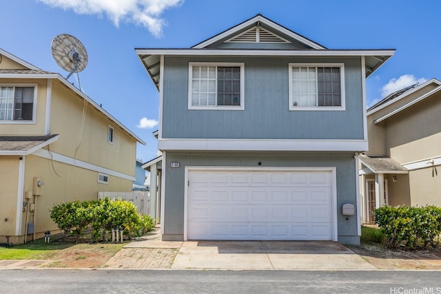 91-1005 Leleoi St Unit 91, Ewa Beach, HI 96706 - view of front facade featuring an attached garage and driveway