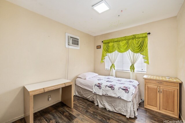 91-1005 Leleoi St Unit 91, Ewa Beach, HI 96706 - bedroom with a wall mounted air conditioner and dark wood finished floors