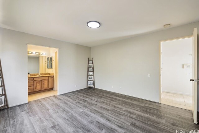 91-1005 Leleoi St Unit 91, Ewa Beach, HI 96706 - unfurnished bedroom featuring wood finished floors and ensuite bath