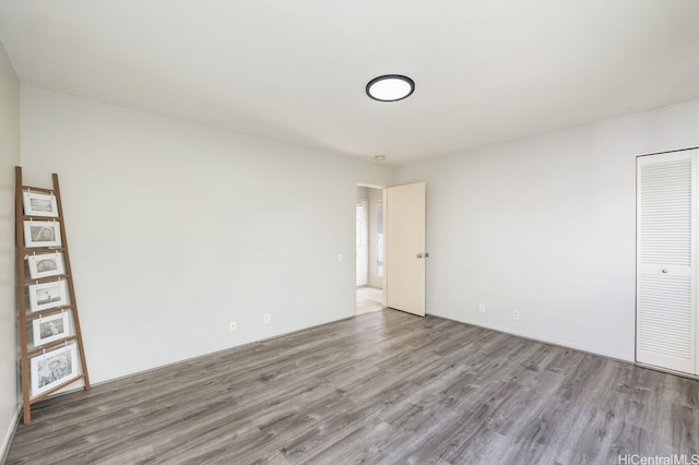 91-1005 Leleoi St Unit 91, Ewa Beach, HI 96706 - empty room with wood finished floors