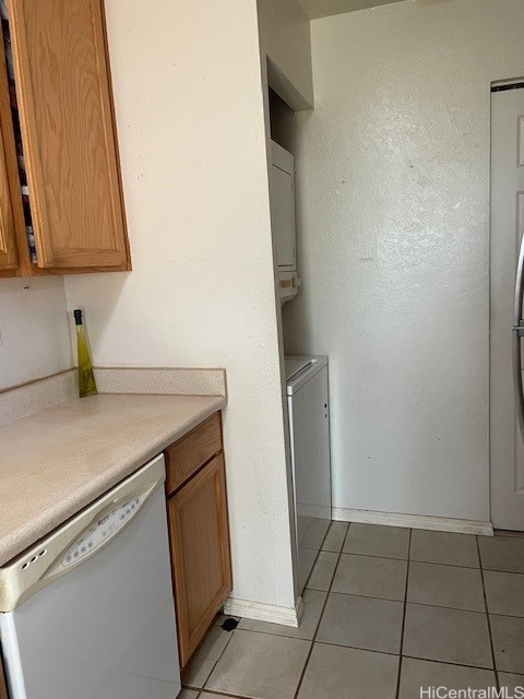 94-427 Keaoopua St Unit 13158, Honolulu, HI 96789 - washroom featuring light tile patterned flooring and washer / dryer