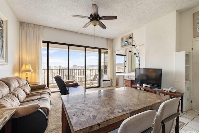 201 Ohua Ave Unit 3702-1, Penthouse Honolulu, HI 96815 - living room featuring a textured ceiling and a ceiling fan