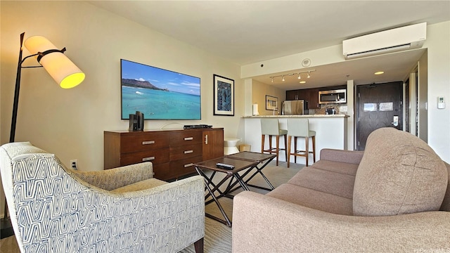 1777 Ala Moana Blvd Unit 2203, Honolulu, HI 96815 - living area featuring an AC wall unit and wood finished floors