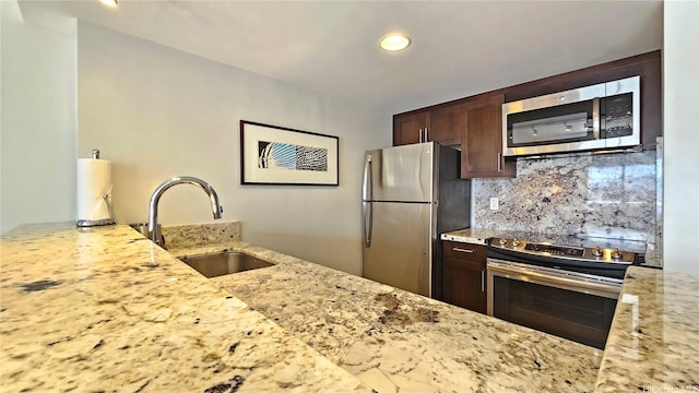 1777 Ala Moana Blvd Unit 2203, Honolulu, HI 96815 - kitchen with appliances with stainless steel finishes, light stone countertops, tasteful backsplash, dark brown cabinetry, and recessed lighting