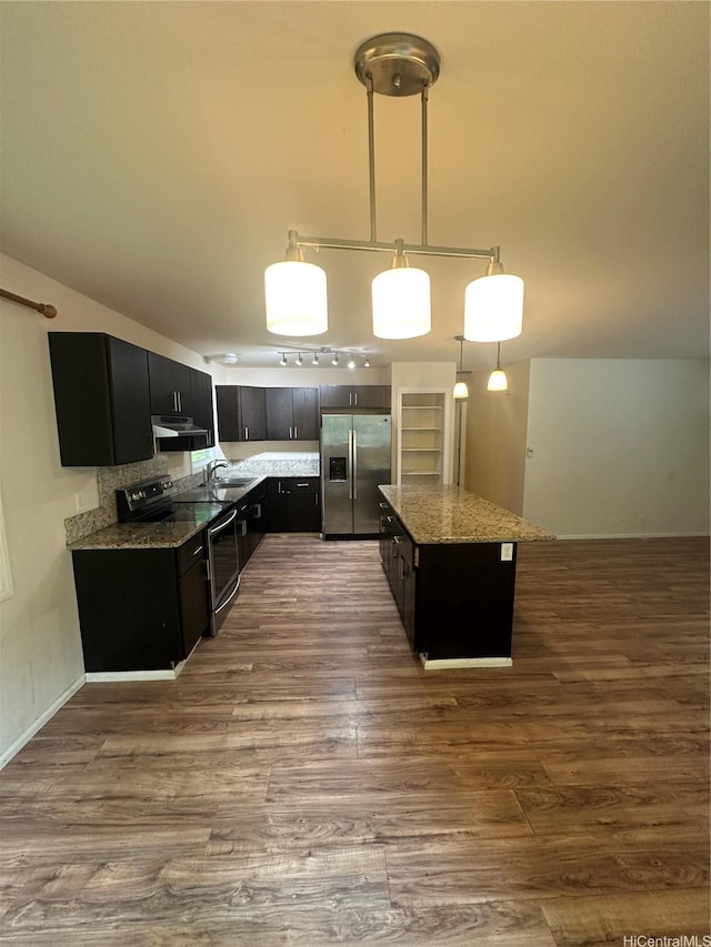 1817 Kalie Pl Unit B, Wahiawa, HI 96786 - kitchen featuring appliances with stainless steel finishes, dark cabinetry, extractor fan, dark wood-type flooring, and light stone countertops