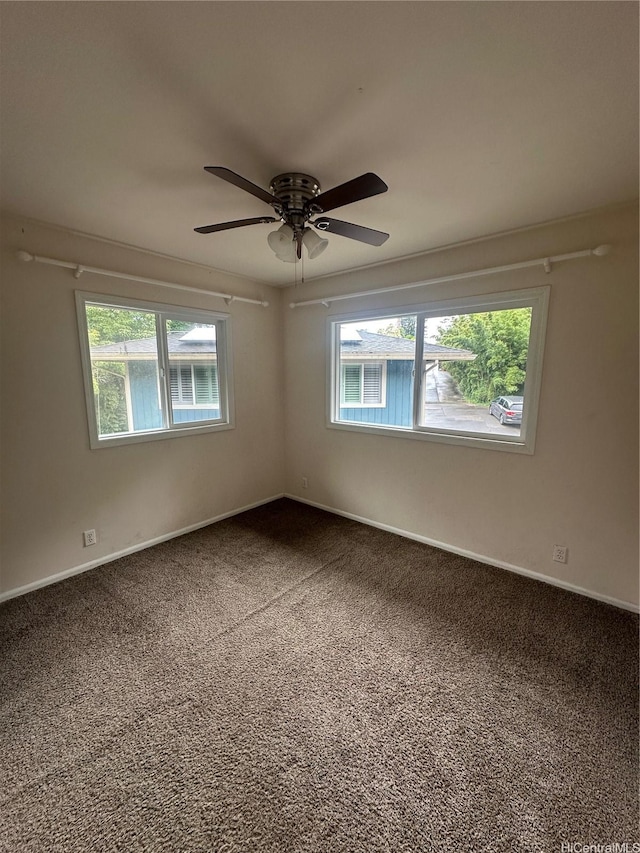 1817 Kalie Pl Unit B, Wahiawa, HI 96786 - unfurnished room featuring dark carpet and a ceiling fan