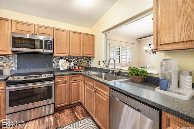 91-1037 Paaoloulu Way, Kapolei, HI 96707 - kitchen featuring stainless steel appliances, dark countertops, decorative backsplash, and dark wood-style floors
