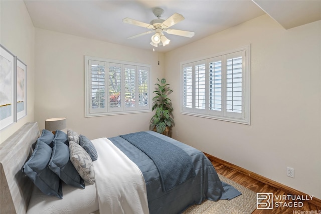 91-1037 Paaoloulu Way, Kapolei, HI 96707 - bedroom with wood finished floors and a ceiling fan