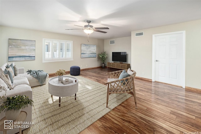 91-1037 Paaoloulu Way, Kapolei, HI 96707 - living room featuring wood finished floors and a ceiling fan