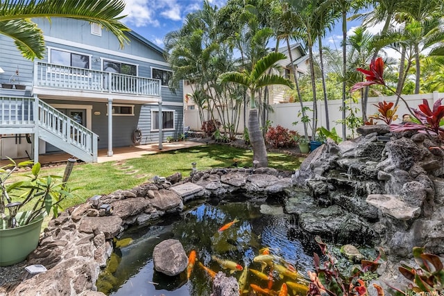 91-1037 Paaoloulu Way, Kapolei, HI 96707 - view of yard with a small pond and stairs