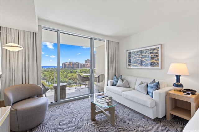 383 Kalaimoku St Unit 1006, Honolulu, HI 96815 - living area featuring expansive windows and a city view