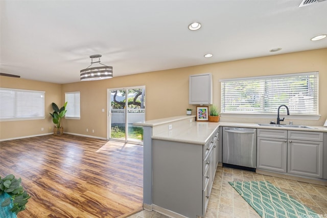 87-2165 Pakeke St Unit 59, Waianae, HI 96792 - kitchen with dishwasher, gray cabinets, a peninsula, light countertops, and recessed lighting