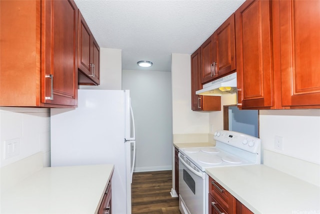 1215 Alexander St Unit 1201, Honolulu, HI 96826 - kitchen with white appliances, under cabinet range hood, light countertops, dark wood-type flooring, and reddish brown cabinets
