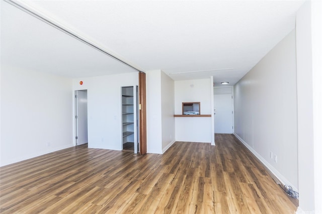 1215 Alexander St Unit 1201, Honolulu, HI 96826 - unfurnished living room with wood finished floors