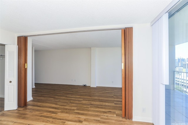 1215 Alexander St Unit 1201, Honolulu, HI 96826 - spare room with wood finished floors