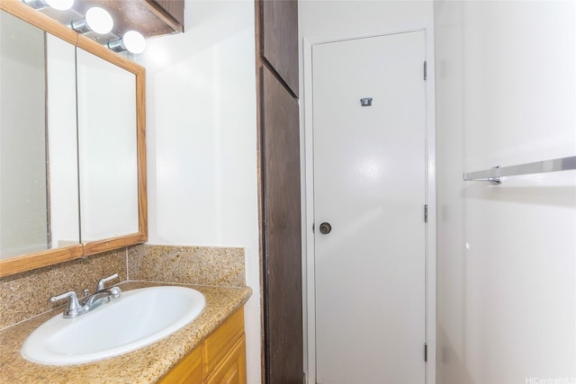 1215 Alexander St Unit 1201, Honolulu, HI 96826 - bathroom featuring vanity and decorative backsplash