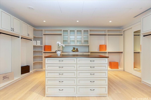 1118 Ala Moana Blvd Unit 2000/2002, Honolulu, HI 96814 - walk in closet with light wood-type flooring