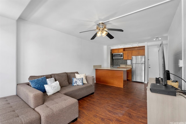 445 Kaiolu St Unit 407, Honolulu, HI 96815 - living area with dark wood-type flooring and ceiling fan