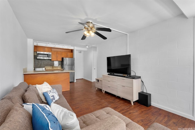 445 Kaiolu St Unit 407, Honolulu, HI 96815 - living area with a ceiling fan and dark wood-style floors