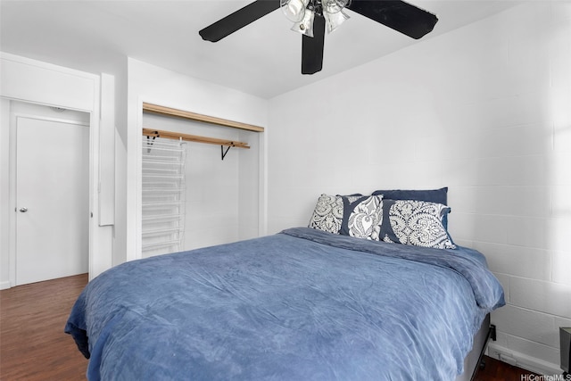 445 Kaiolu St Unit 407, Honolulu, HI 96815 - bedroom with wood finished floors, a ceiling fan, and a closet