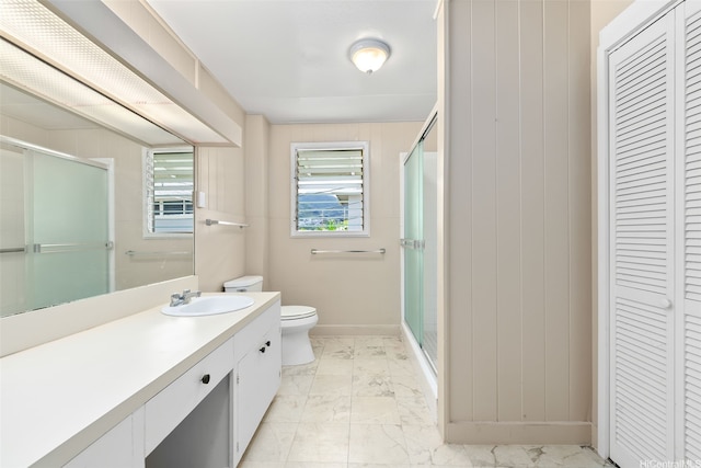 2061 10th Ave, Honolulu, HI 96816 - bathroom with a closet, vanity, a shower stall, and marble look tile flooring