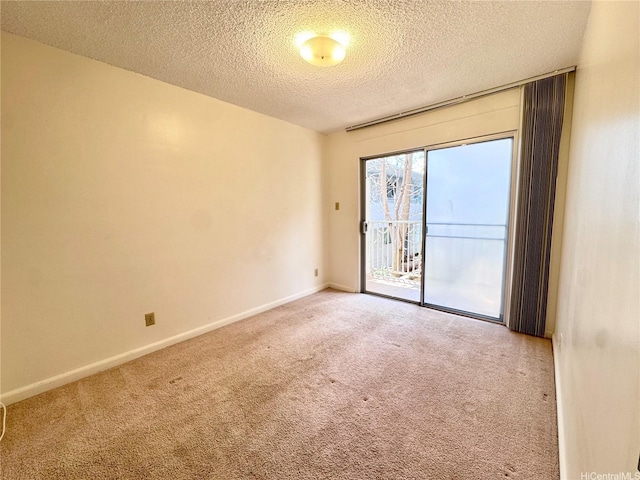 1036 Green St Unit 204, Honolulu, HI 96822 - carpeted empty room with a textured ceiling and baseboards