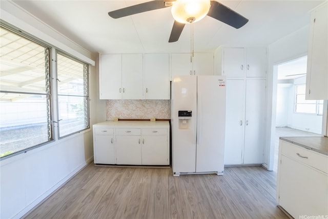 741 Alewa Dr Unit A, Honolulu, HI 96817 - kitchen with white refrigerator with ice dispenser, light wood-type flooring, and light countertops