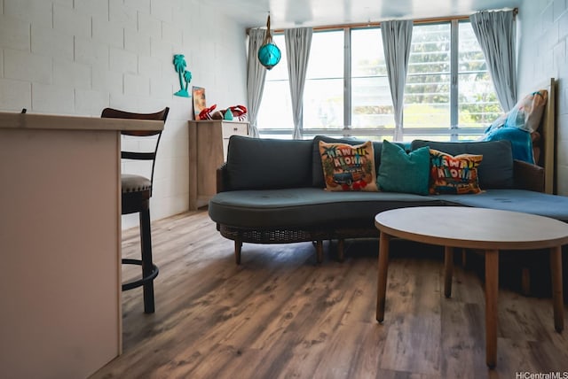 53-549 Kamehameha Hwy Unit 211, Hauula, HI 96717 - living room with wood finished floors and concrete block wall