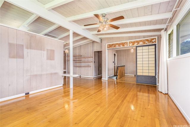 3313 Manoa Rd, Honolulu, HI 96822 - unfurnished living room with wooden walls, a ceiling fan, and hardwood / wood-style floors