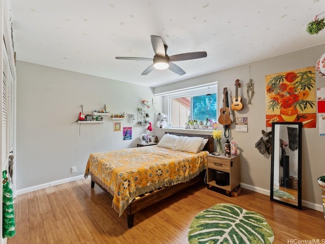 46-63 Emepela Pl Unit P205, Kaneohe, HI 96744 - bedroom featuring wood finished floors and a ceiling fan