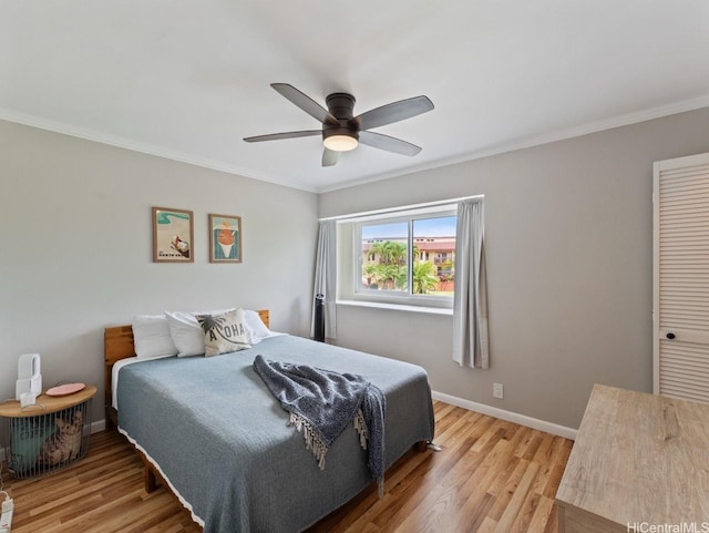 46-63 Emepela Pl Unit P205, Kaneohe, HI 96744 - bedroom with ornamental molding, light wood-style floors, and a ceiling fan
