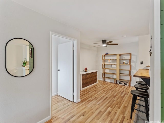 46-63 Emepela Pl Unit P205, Kaneohe, HI 96744 - corridor featuring light wood-style flooring and baseboards