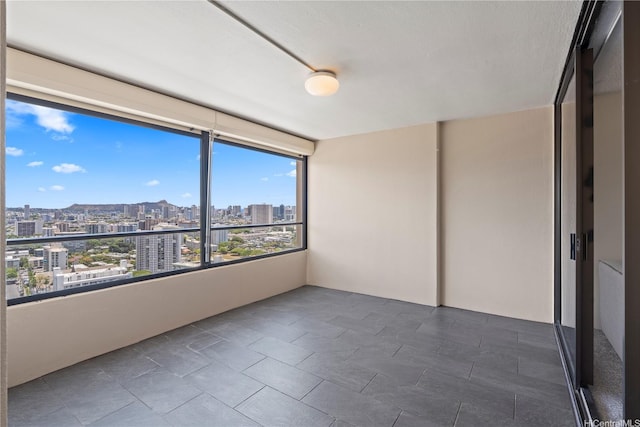 1717 Mott Smith Dr Unit 2811, Honolulu, HI 96822 - empty room featuring a view of city